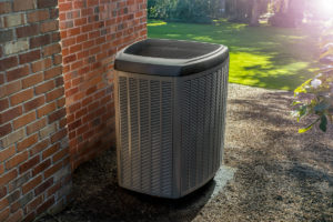 Heat pump outside of home. Apex Air in Vancouver WA explains the factors that go into HVAC costs.